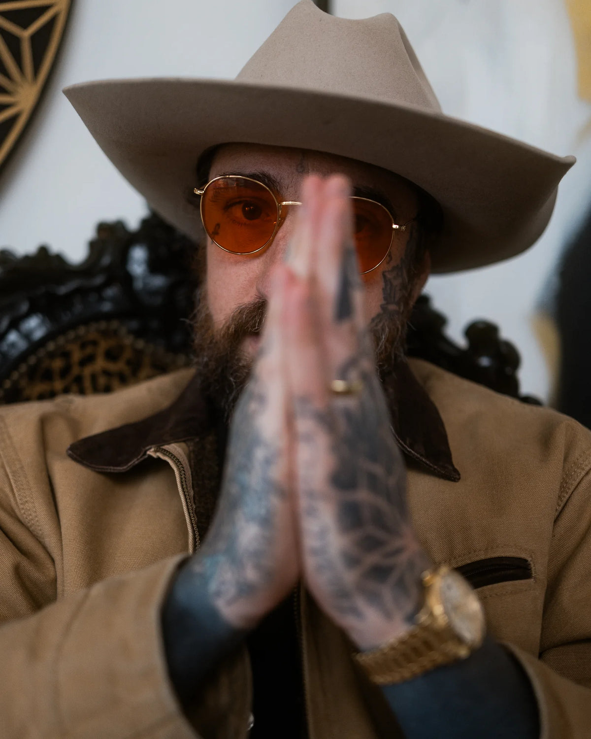 Tattoo artist Dillon Forte, GRAPHICA Global Top 100, hands pressed together in prayer
