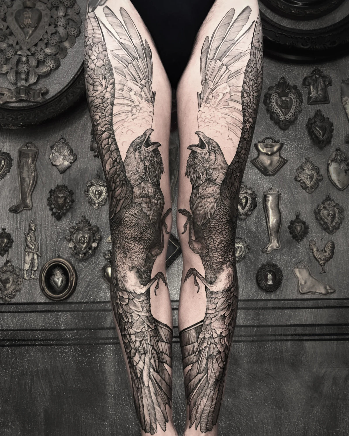 Twin raven leg sleeves by tattoo artist Marco C. Matarese